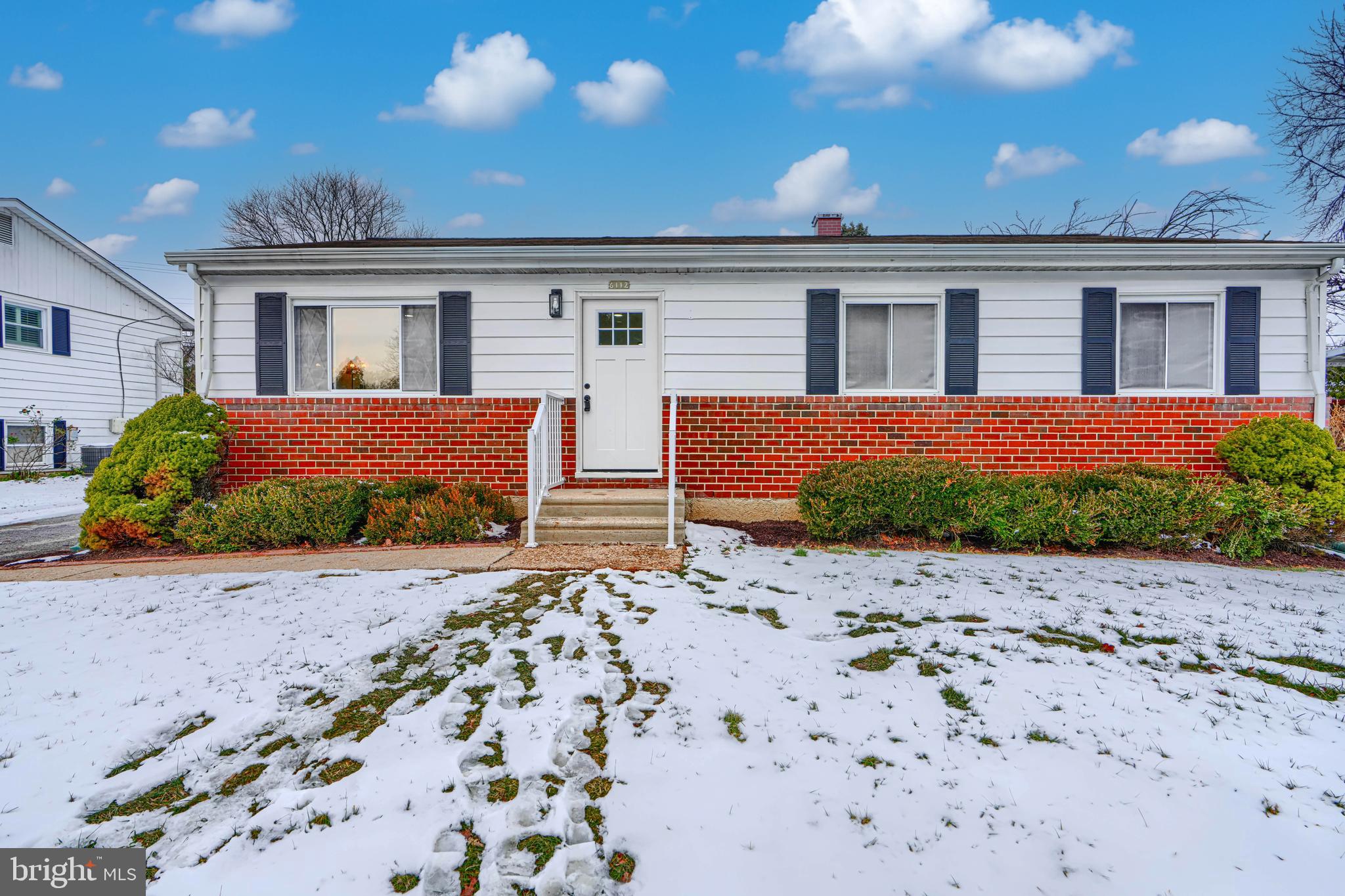 6112 Chesworth Road Baltimore, MD 21228 - Photo 2 of 47 front view of a house with a patio