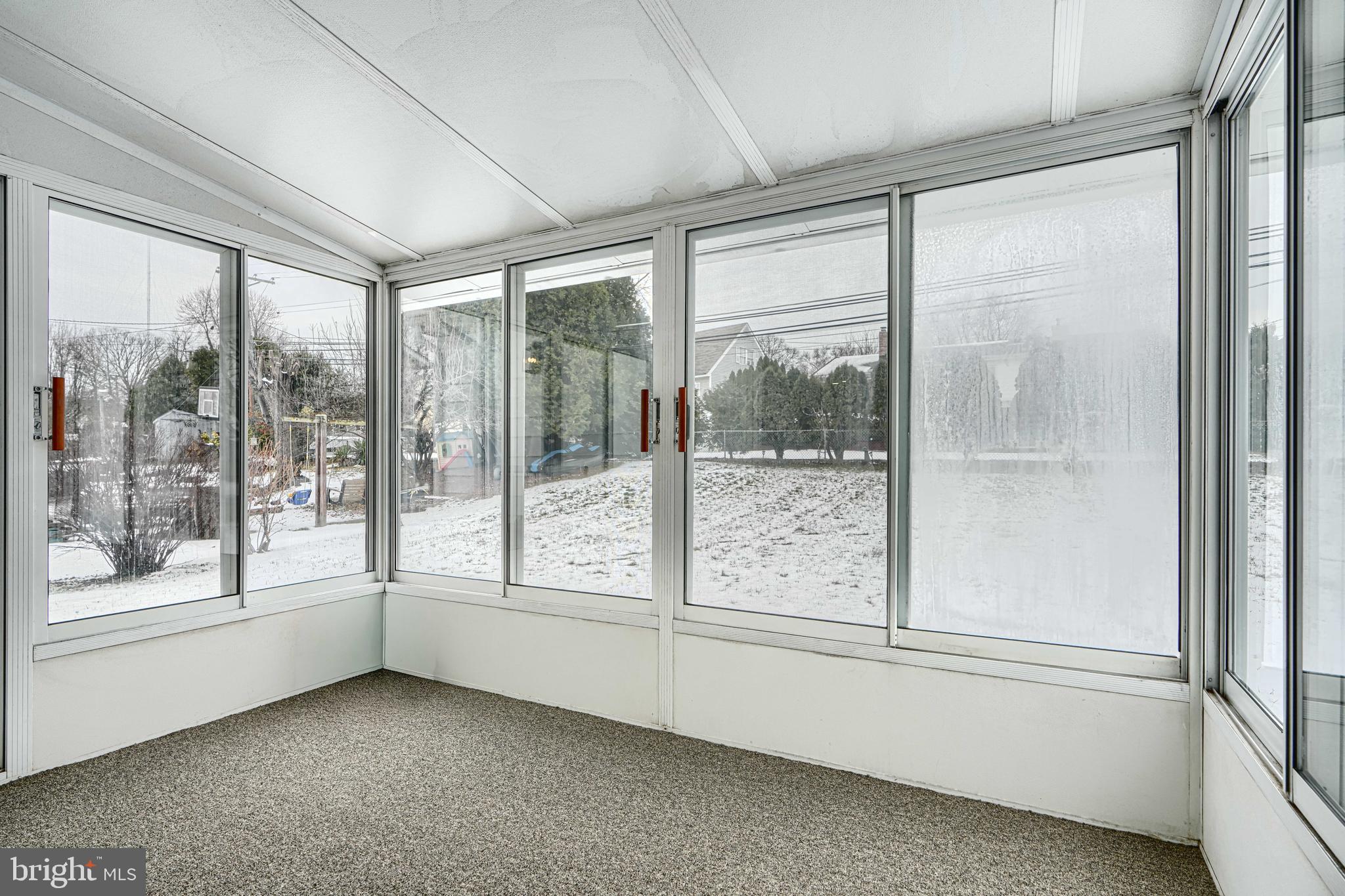 6112 Chesworth Road Baltimore, MD 21228 - Photo 25 of 47 a view of an empty room and window