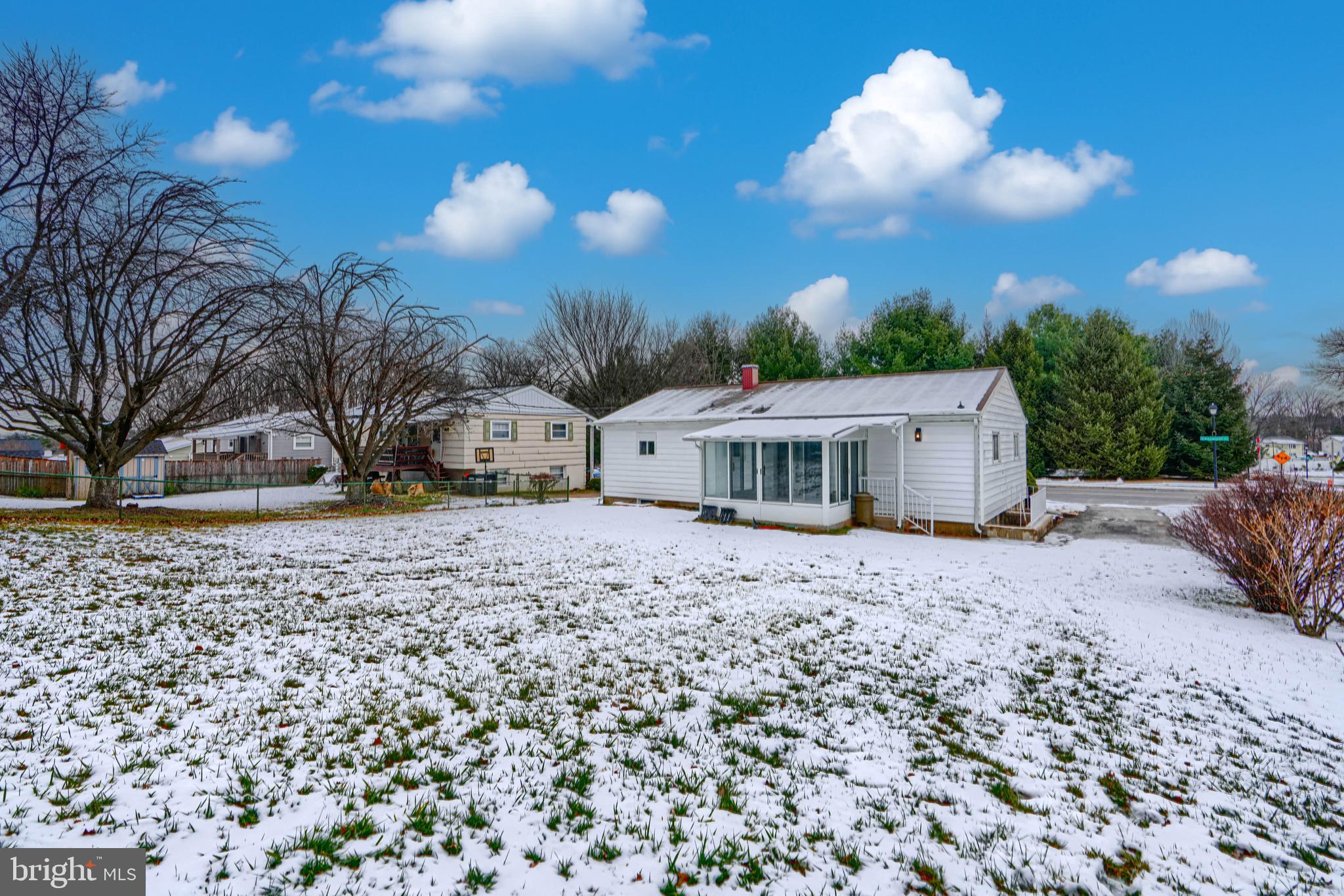 6112 Chesworth Road Baltimore, MD 21228 - Photo 4 of 47 a view of a house with a yard