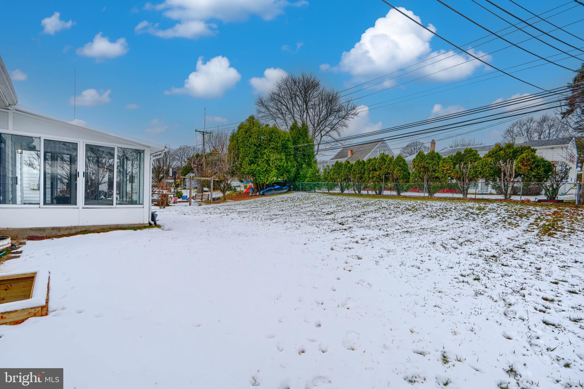 6112 Chesworth Road Baltimore, MD 21228 - Photo 7 of 47 a view of a backyard