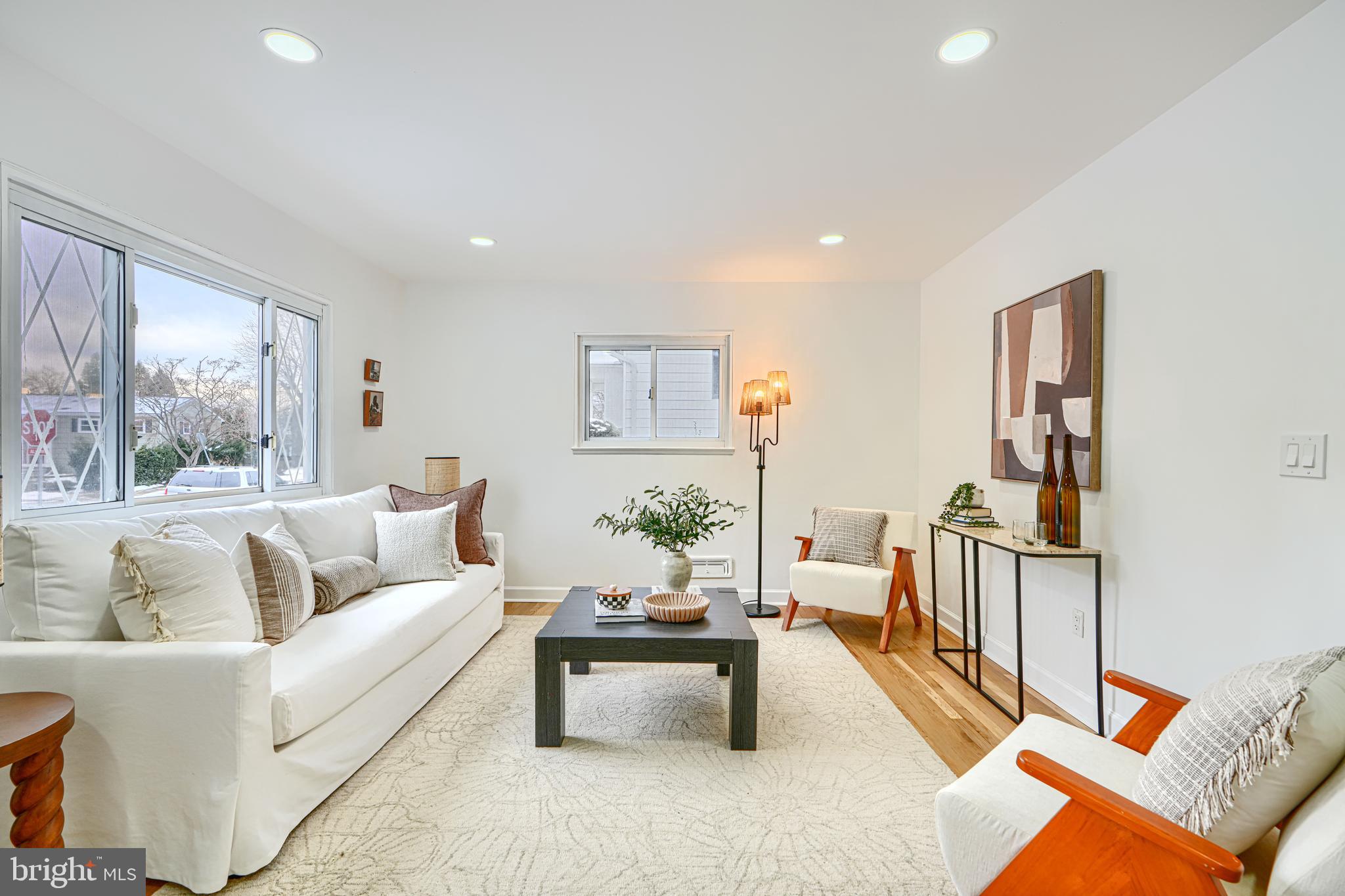6112 Chesworth Road Baltimore, MD 21228 - Photo 8 of 47 a living room with furniture and a large window