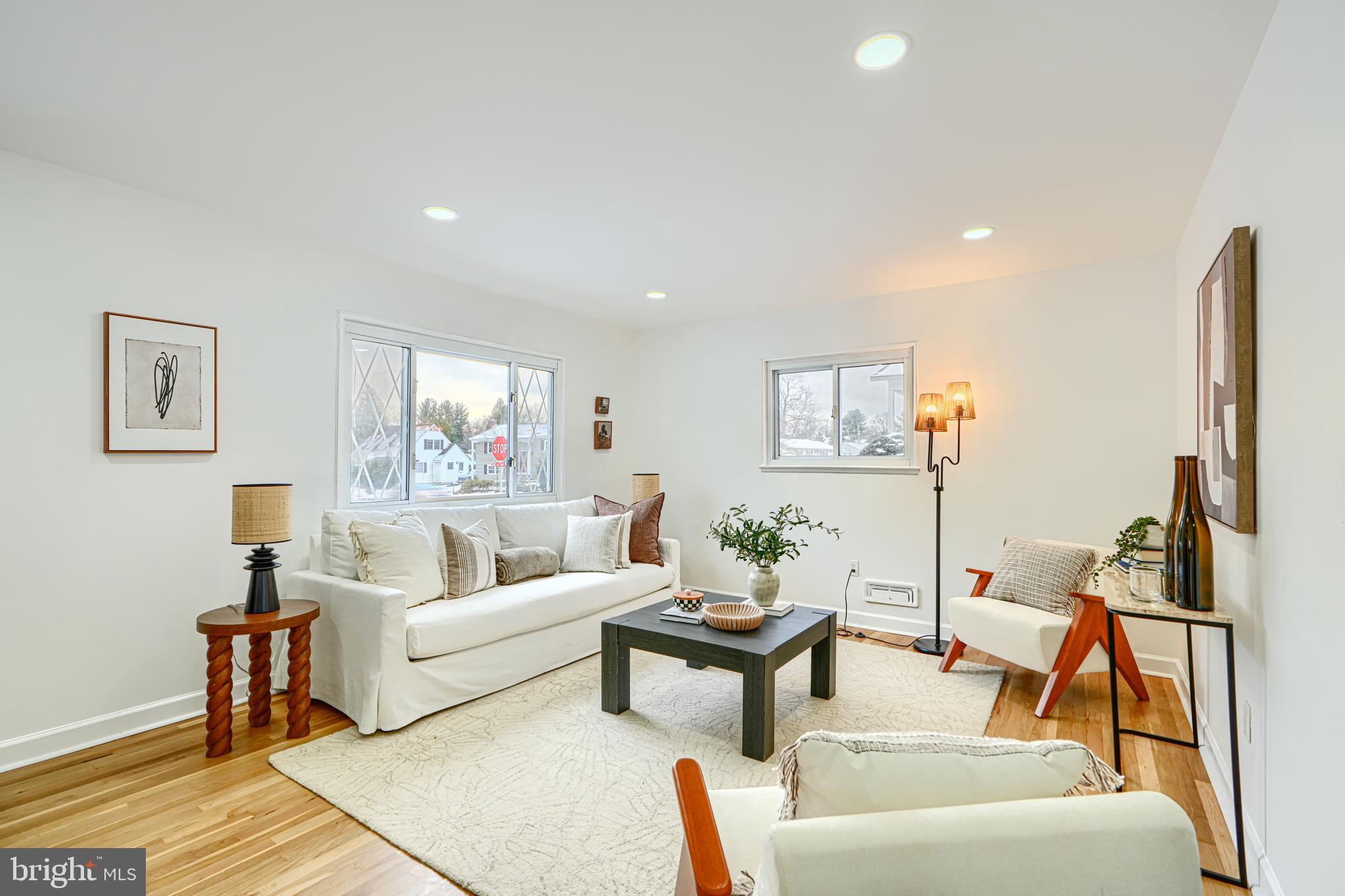 6112 Chesworth Road Baltimore, MD 21228 - Photo 9 of 47 a living room with furniture and a flat screen tv