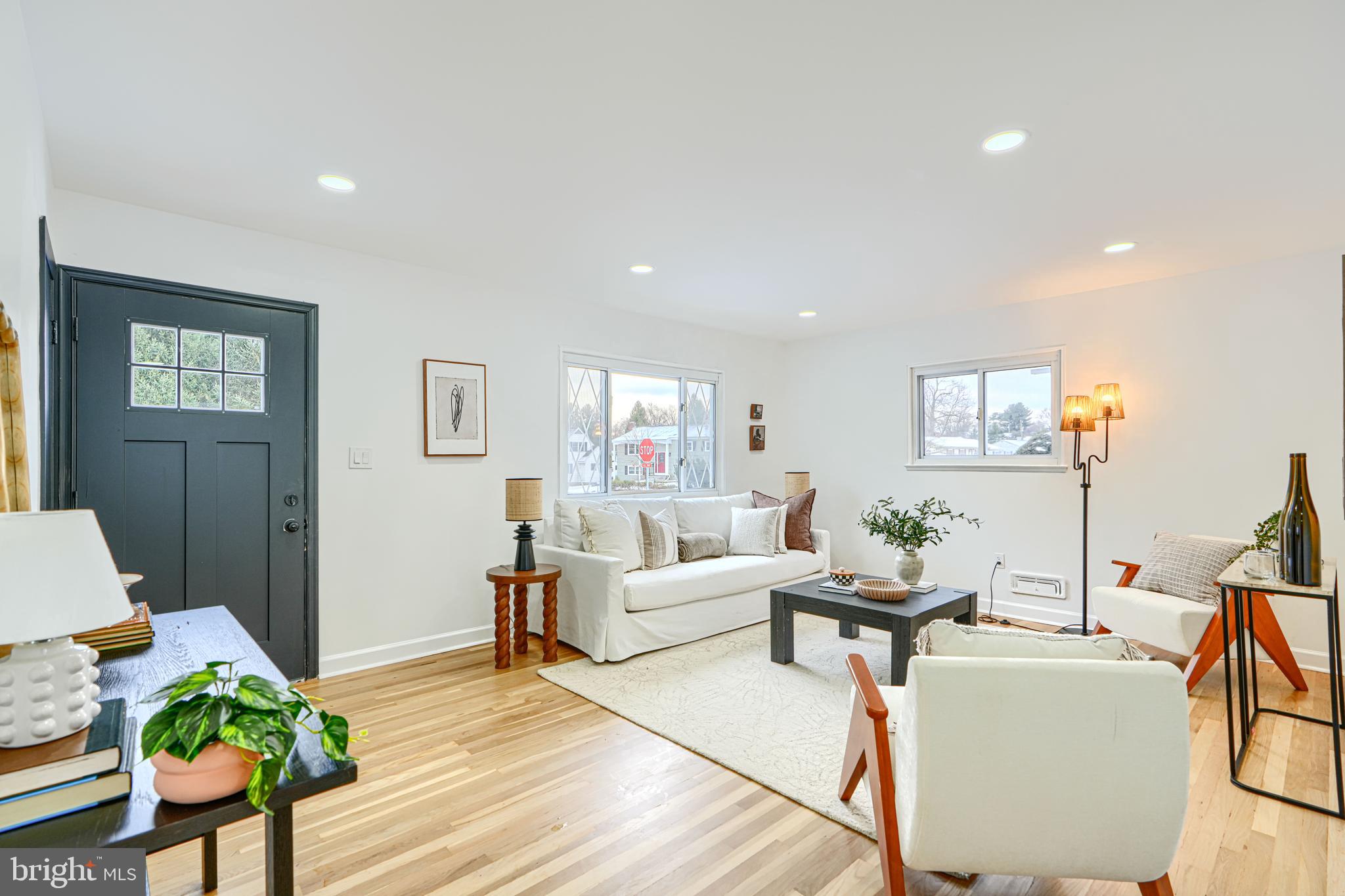 6112 Chesworth Road Baltimore, MD 21228 - Photo 10 of 47 a living room with furniture and a wooden floor