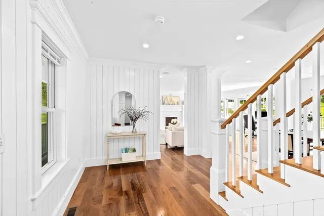 a view of entryway with wooden floor and stair