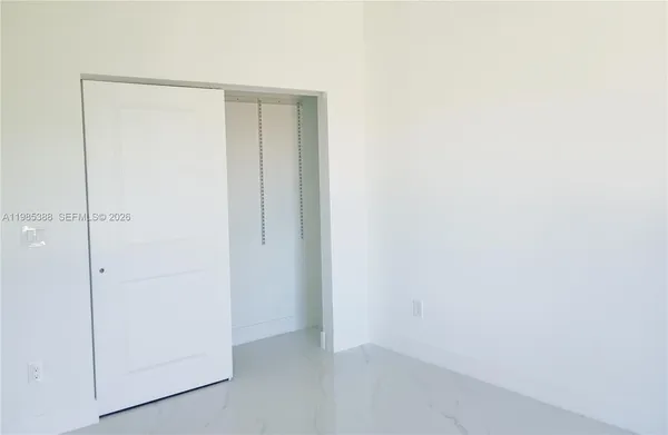 a view of a room with a door