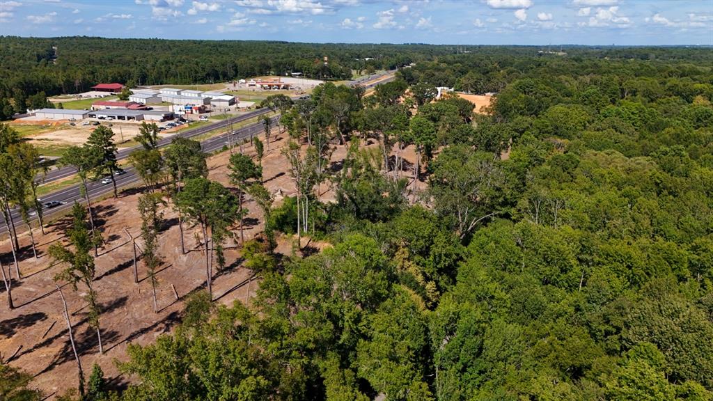 16393 West State Highway Tyler, TX 75709 - Photo 19 of 25 a view of a house with a yard