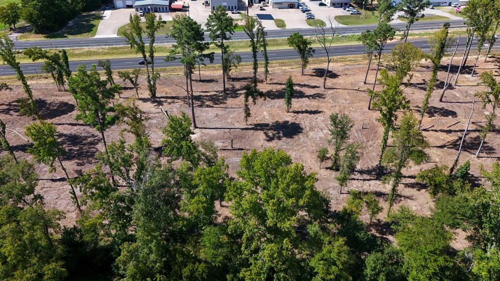 16393 West State Highway Tyler, TX 75709 - Photo 20 of 25 a view of multiple houses with yard
