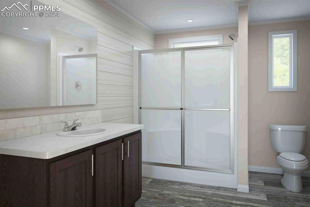 35330 Vorenberg Road Yoder, CO 80864 - Photo 4 of 4 a bathroom with a sink toilet and shower