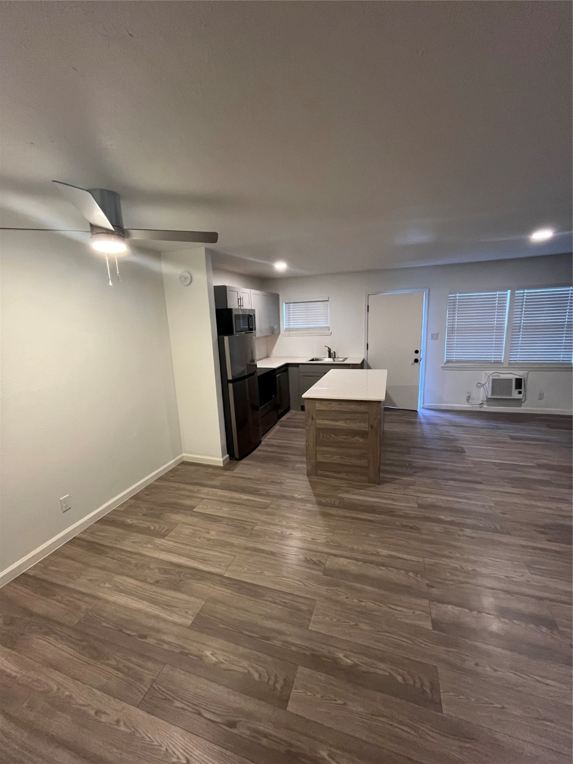 1722 Colquitt Street, Unit 4 Houston, TX 77098 - Photo 4 of 7 a view of kitchen with wooden floor