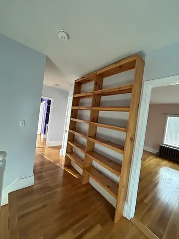a view of entryway with wooden floor