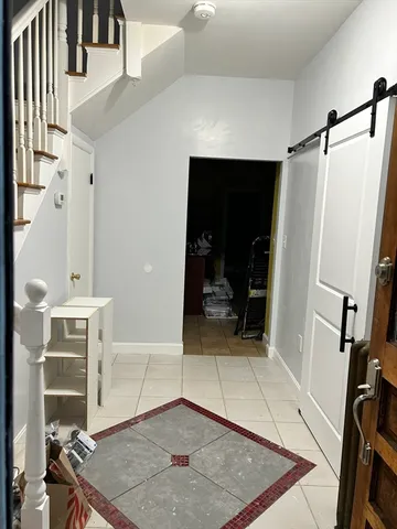 a view of livingroom with furniture and hardwood floor