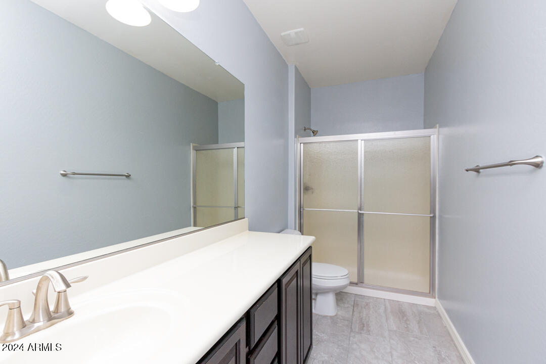 Undisclosed Address Gilbert, AZ 85298 - Photo 30 of 36 a bathroom with a sink and toilet