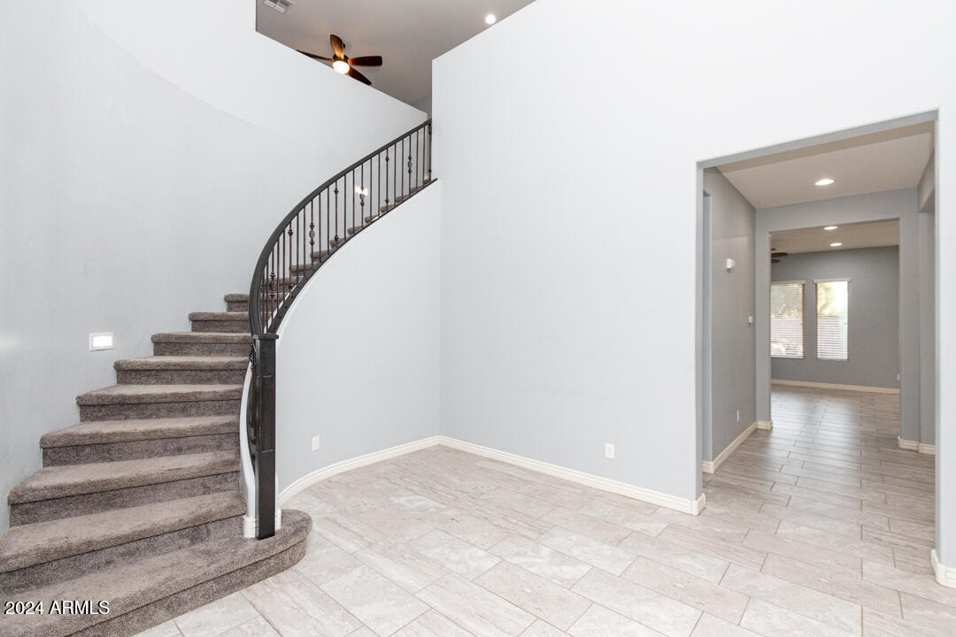 Undisclosed Address Gilbert, AZ 85298 - Photo 7 of 36 a view of entryway and hall with wooden floor