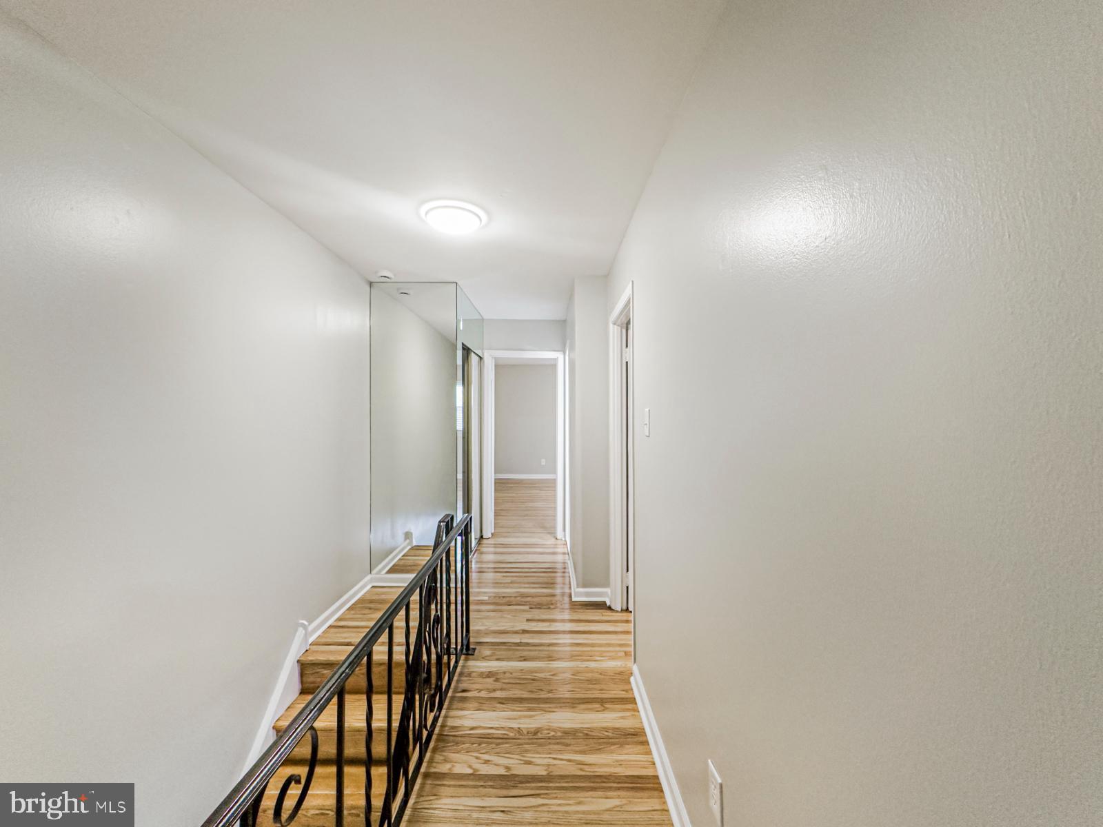 11118 Ridgeway Street Philadelphia, PA 19116 - Photo 15 of 38 a view of a hallway with wooden floor