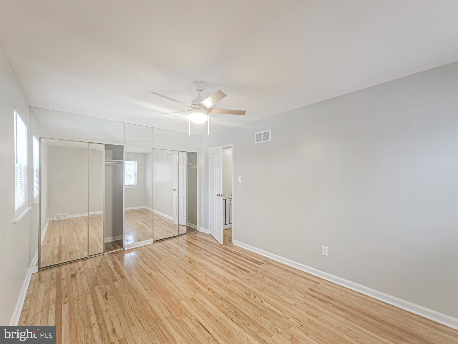 11118 Ridgeway Street Philadelphia, PA 19116 - Photo 17 of 38 a view of empty room with wooden floor