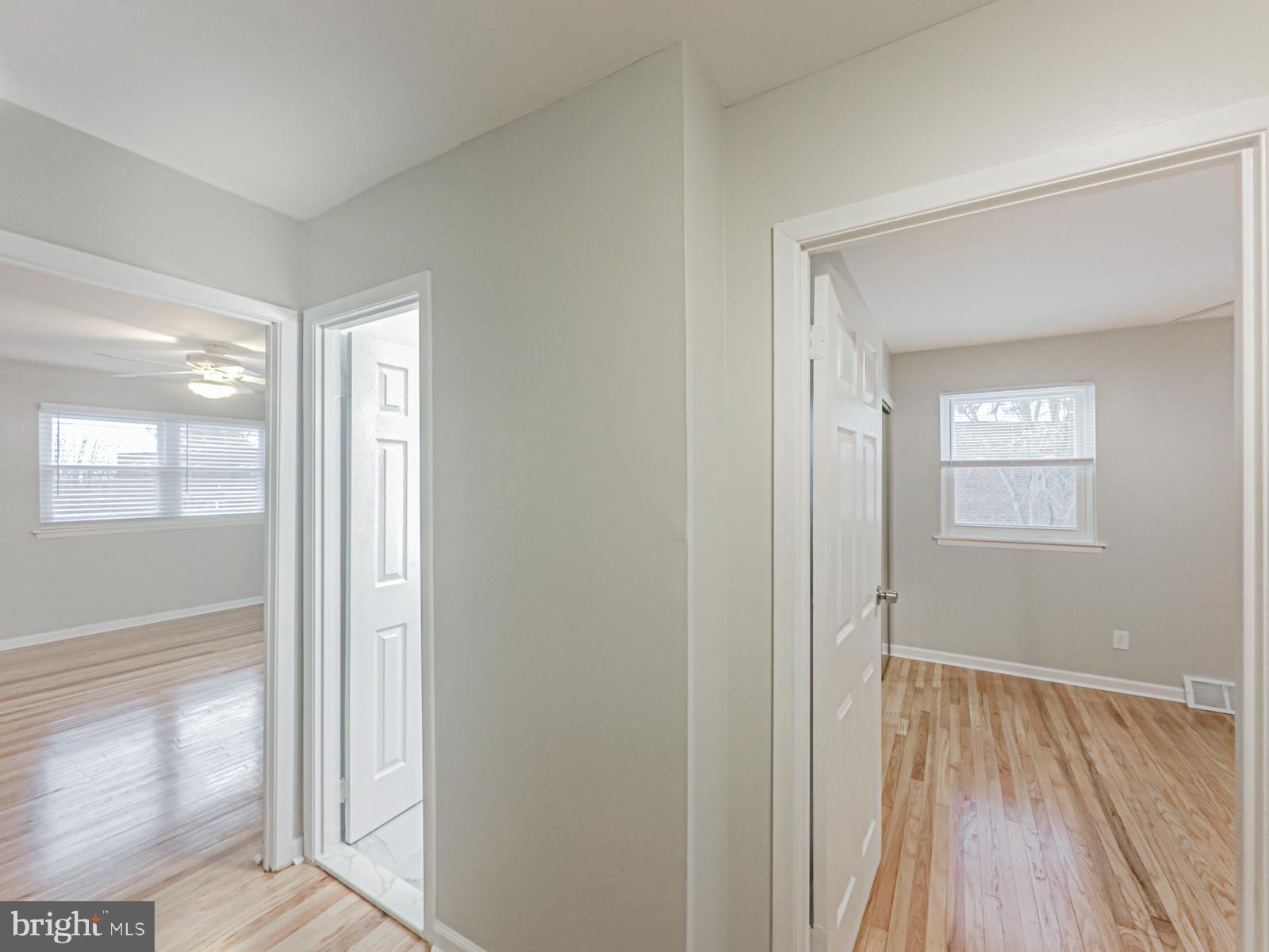11118 Ridgeway Street Philadelphia, PA 19116 - Photo 21 of 38 a view of a hallway with wooden floor and windows