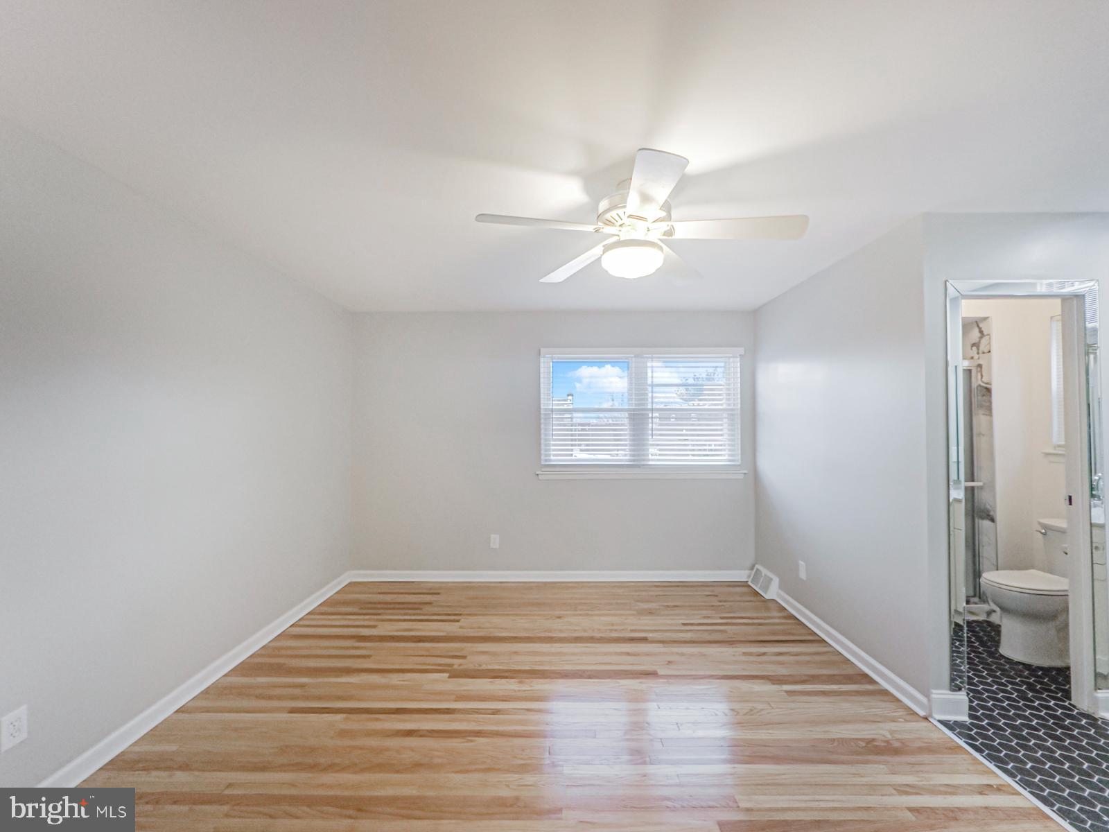 11118 Ridgeway Street Philadelphia, PA 19116 - Photo 24 of 38 a view of a room with wooden floor and fan