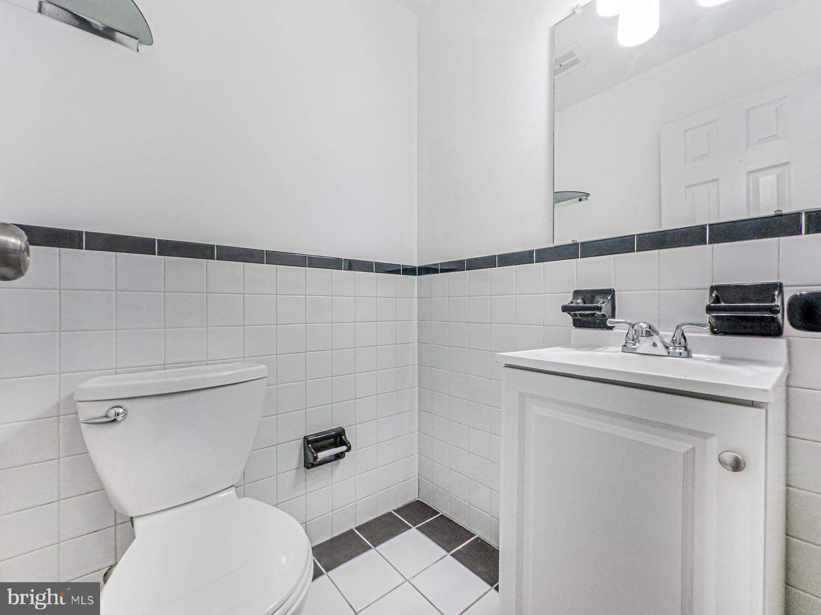 11118 Ridgeway Street Philadelphia, PA 19116 - Photo 31 of 38 a bathroom with a toilet and a sink