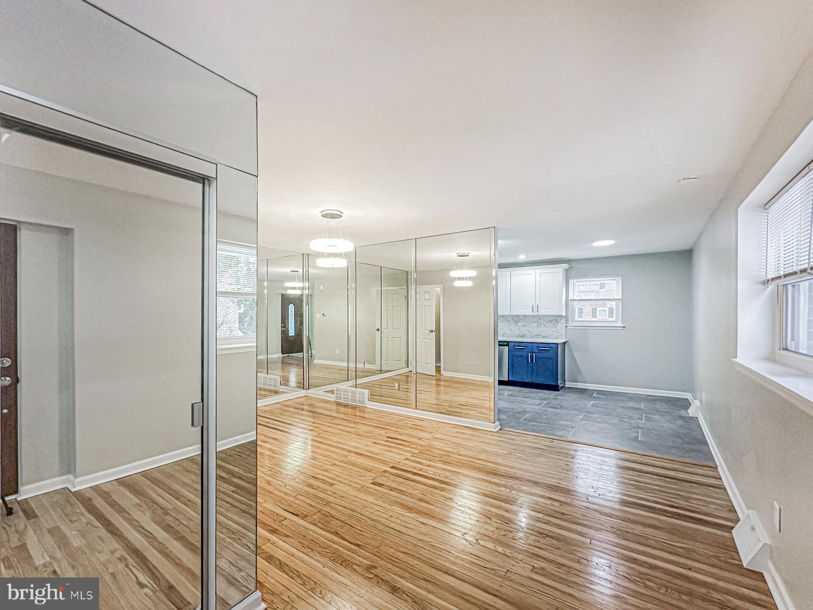 11118 Ridgeway Street Philadelphia, PA 19116 - Photo 5 of 38 a view of an empty room with wooden floor and a window