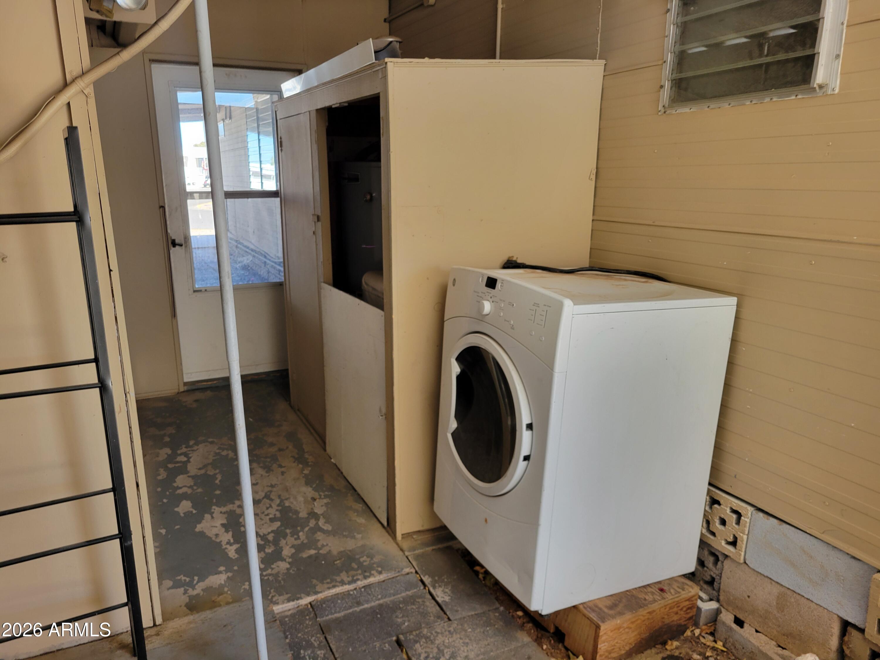 2460 East Main Street, Unit S03 Mesa, AZ 85213 - Photo 19 of 21 a utility room with dryer and washer
