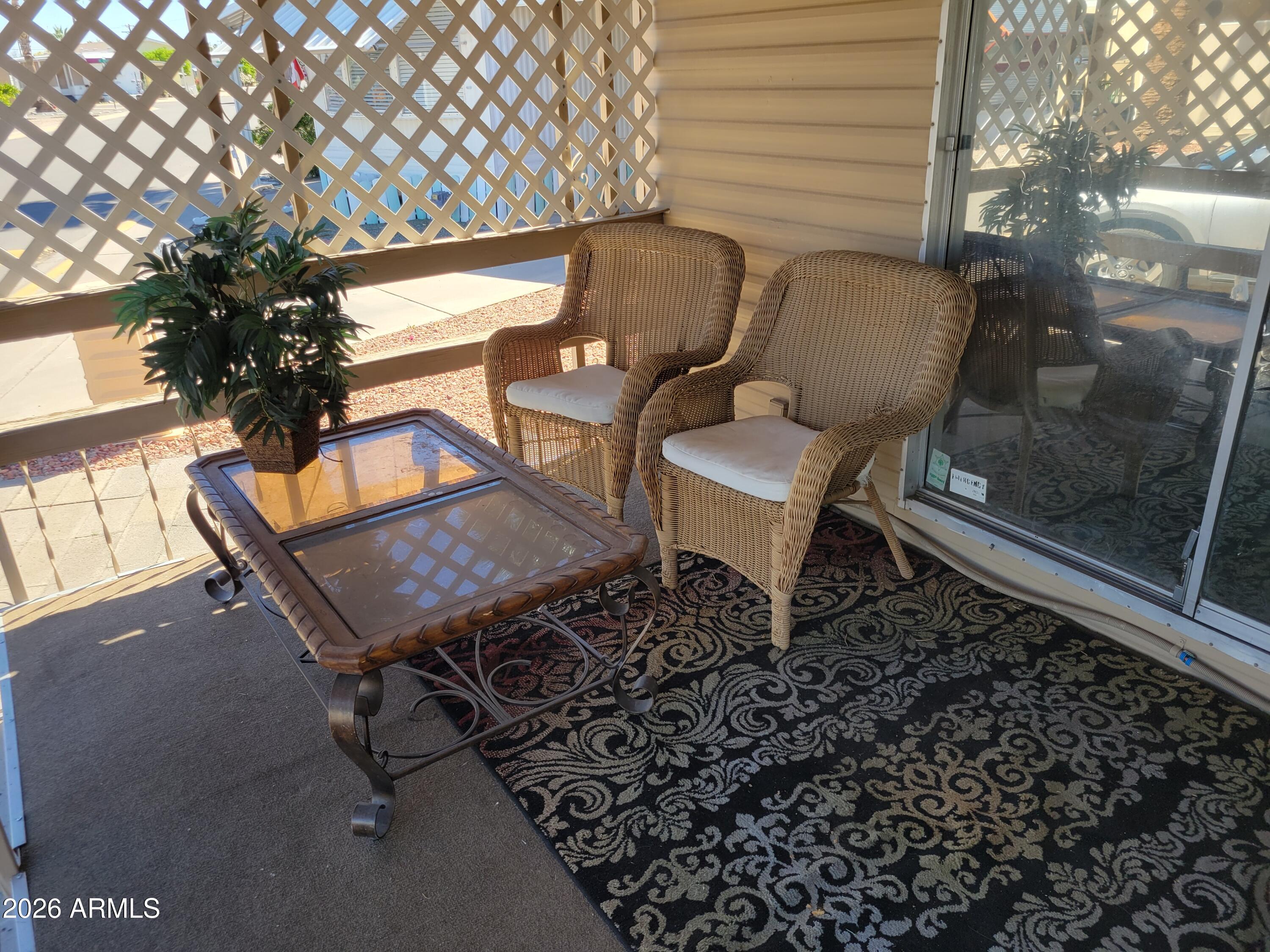 2460 East Main Street, Unit S03 Mesa, AZ 85213 - Photo 20 of 21 a backyard of a house with table and chairs