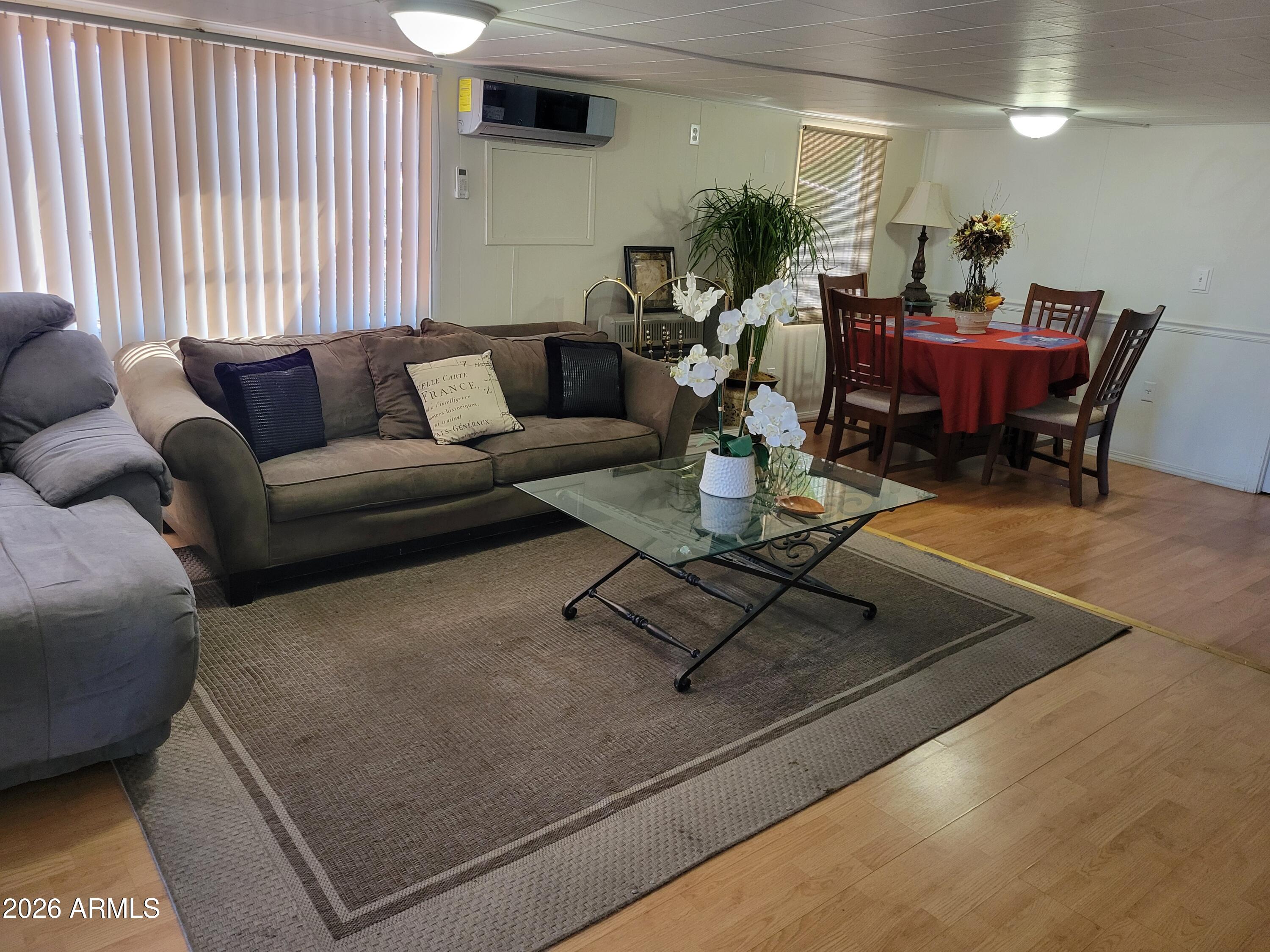 2460 East Main Street, Unit S03 Mesa, AZ 85213 - Photo 3 of 21 a living room with furniture