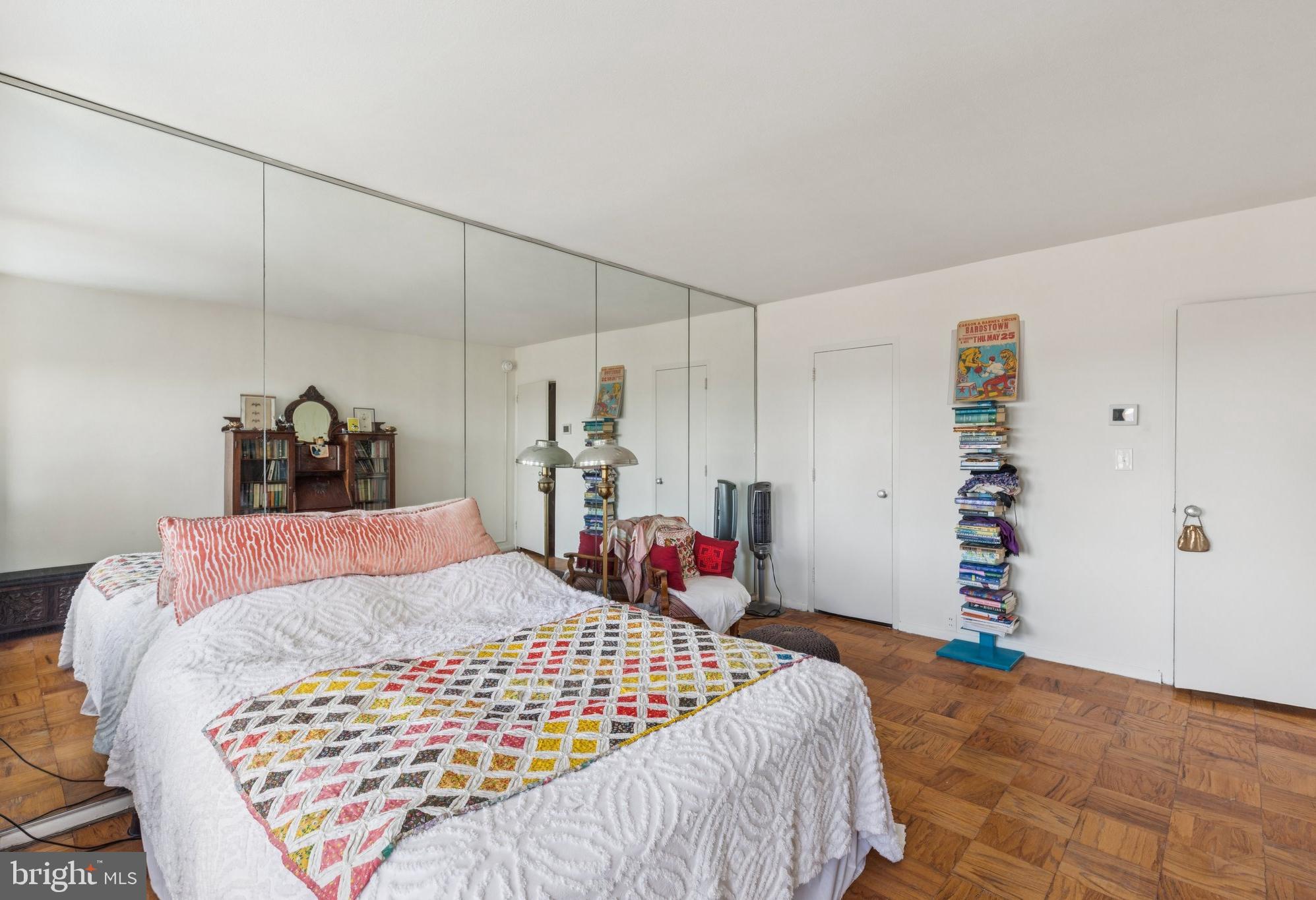 210 Locust Street, Unit 7AW Philadelphia, PA 19106 - Photo 7 of 16 a bedroom with a bed and a window