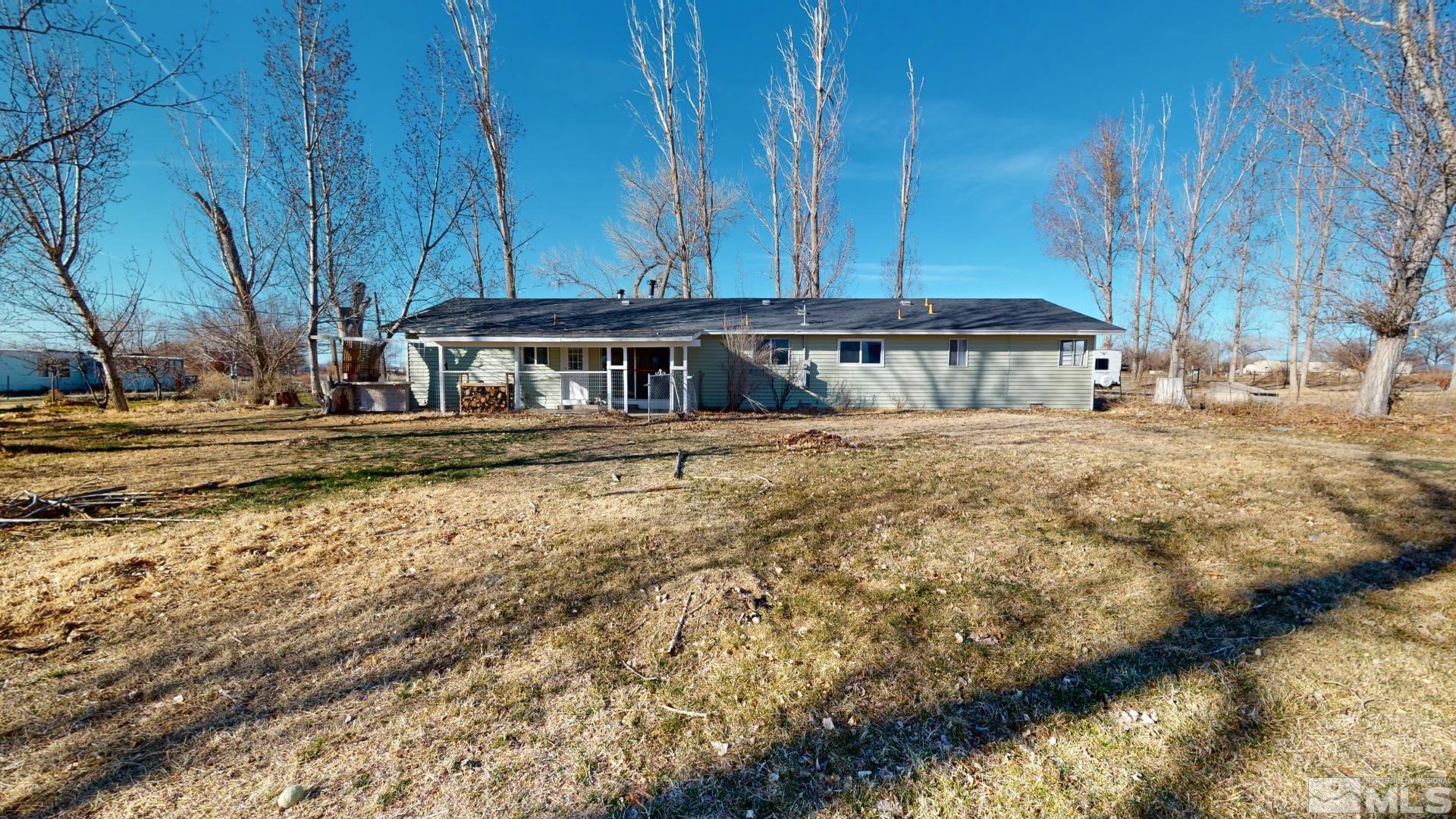 4121 Solias Road Fallon, NV 89406 - Photo 3 of 37 a view of a house with a big yard