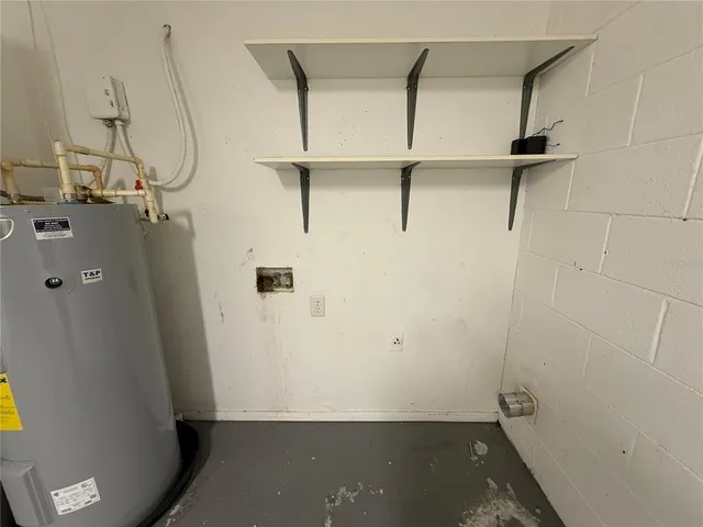 a view of a room with wooden walls