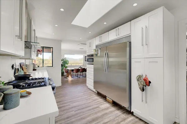 a view of a storage & utility room with washer and dryer
