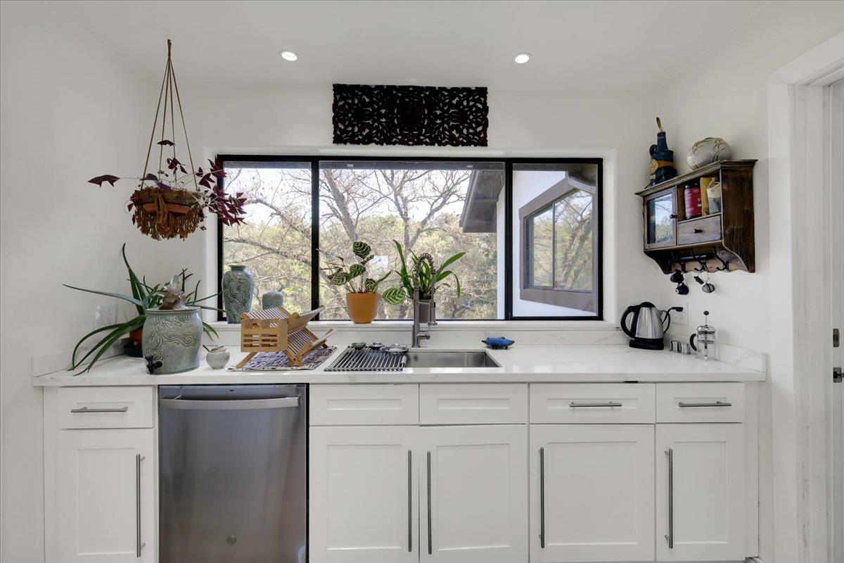 17513 Derby Way Penn Valley, CA 95946 - Photo 18 of 78 a bathroom with a sink and a mirror