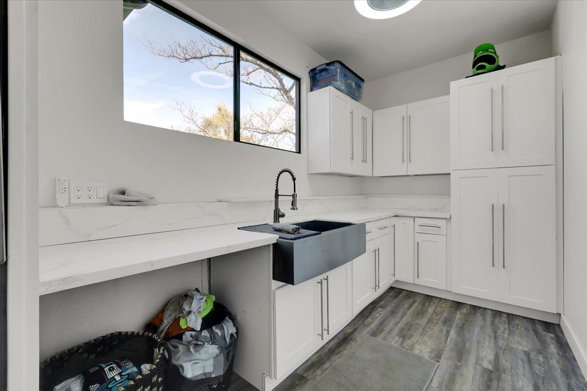 17513 Derby Way Penn Valley, CA 95946 - Photo 20 of 78 a kitchen with a sink cabinets and a window