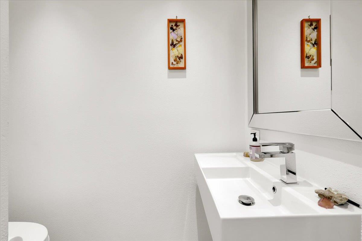 17513 Derby Way Penn Valley, CA 95946 - Photo 23 of 78 a bathroom with a sink and a toilet