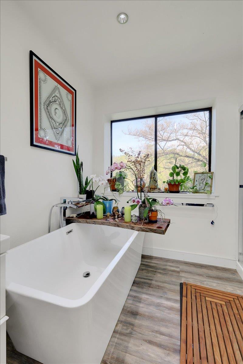 17513 Derby Way Penn Valley, CA 95946 - Photo 25 of 78 a white bath tub sitting next to a window
