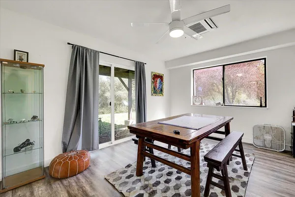 a view of outdoor space with wooden floor