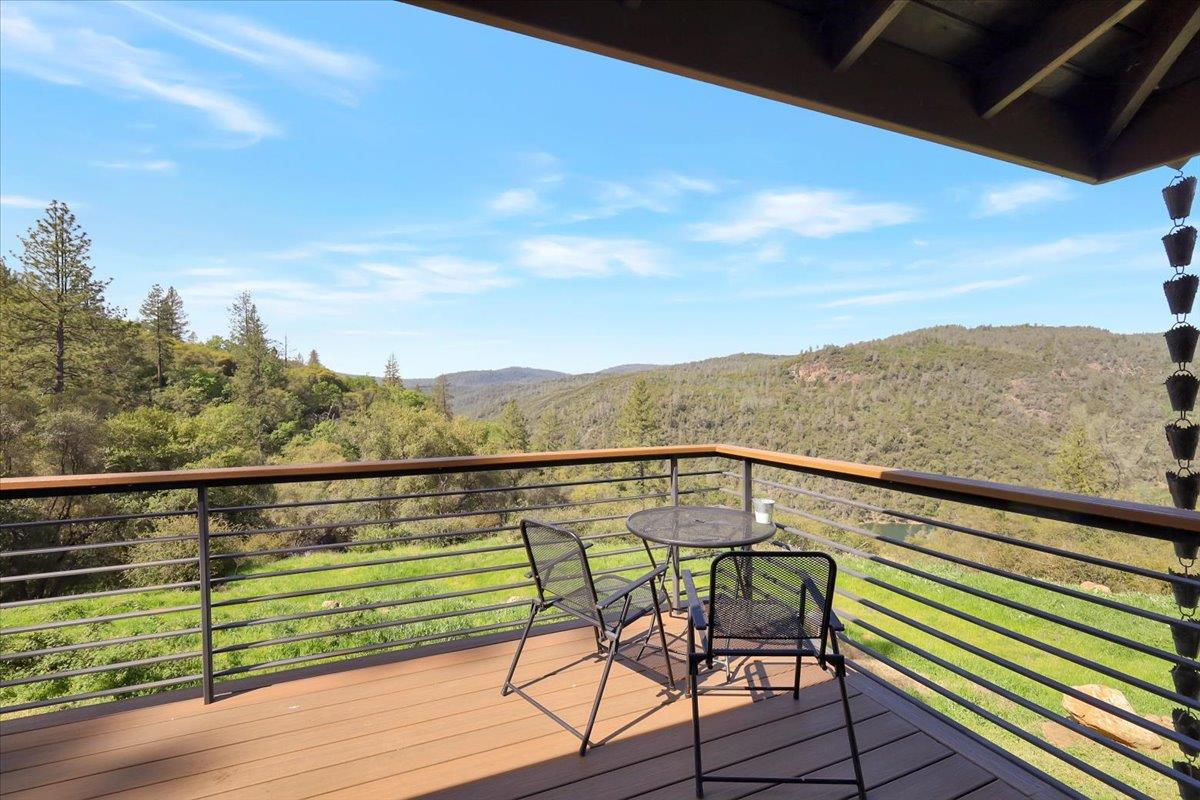 17513 Derby Way Penn Valley, CA 95946 - Photo 40 of 78 a view of a city from a balcony with furniture