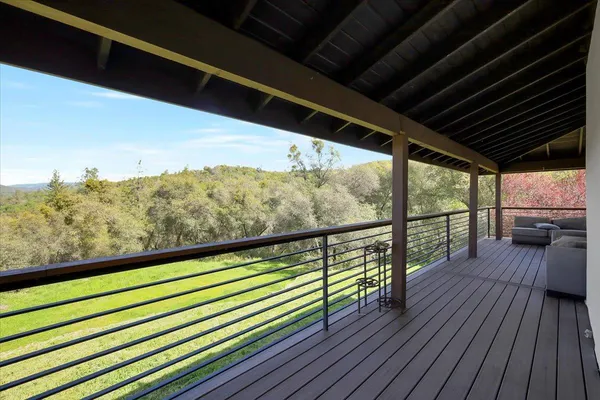 a view of a backyard of the house