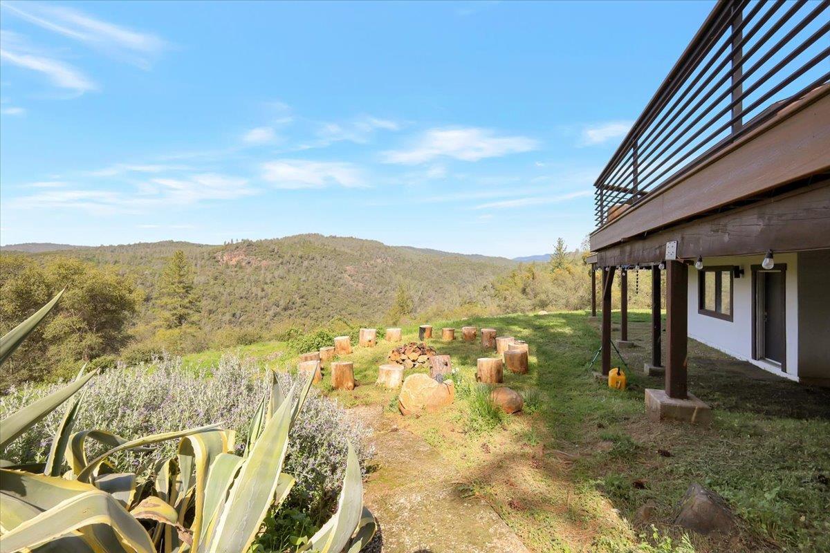 17513 Derby Way Penn Valley, CA 95946 - Photo 49 of 78 a view of a house with a mountain