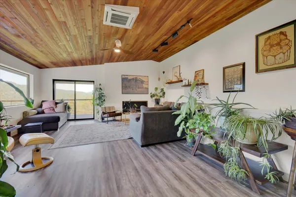 a living room with furniture and a table