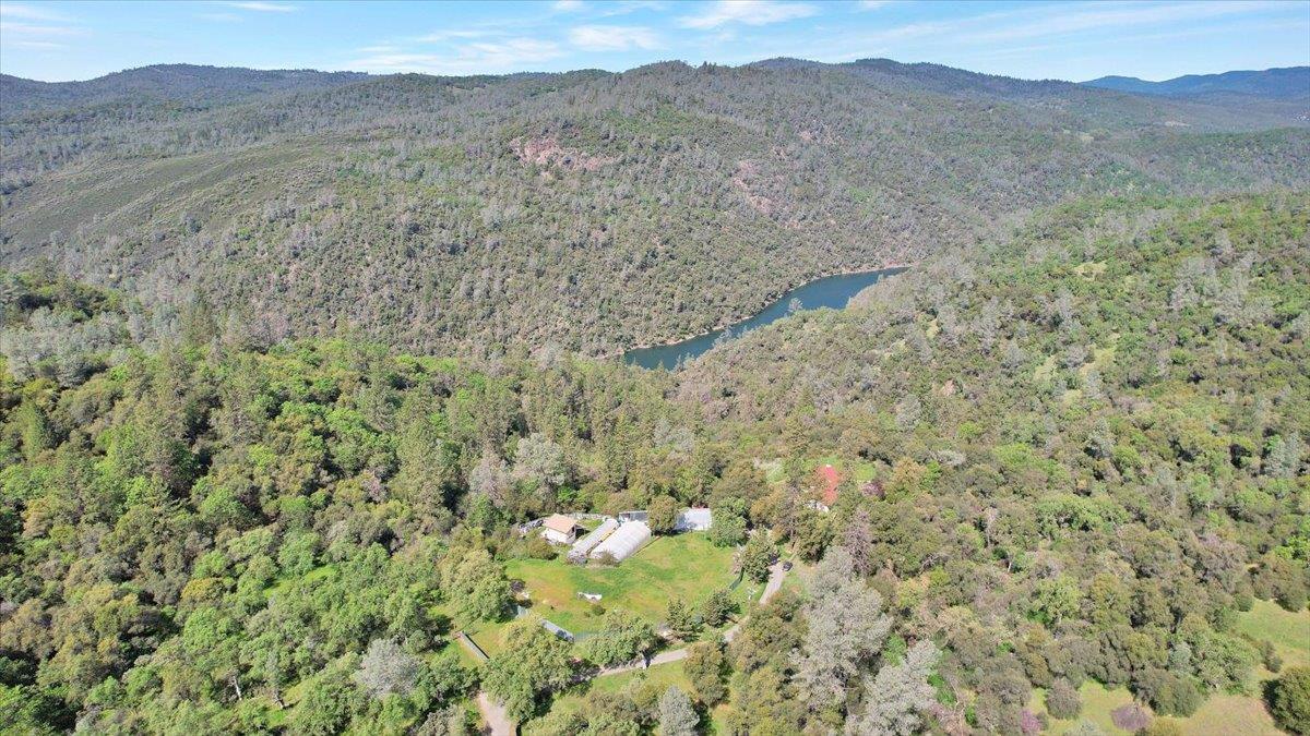 17513 Derby Way Penn Valley, CA 95946 - Photo 68 of 78 a view of a dry field with mountains in the background