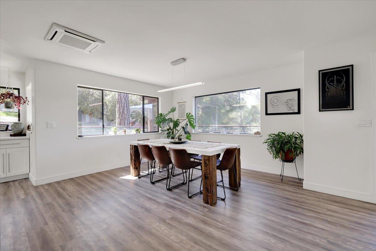 17513 Derby Way Penn Valley, CA 95946 - Photo 9 of 78 a view of a dining room with furniture and wooden floor