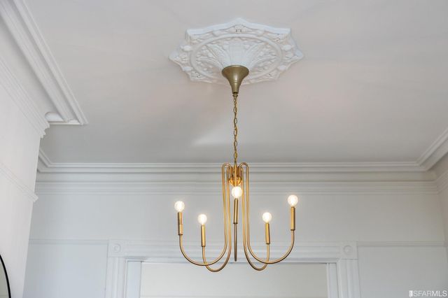 a view of a backyard with plants and a patio