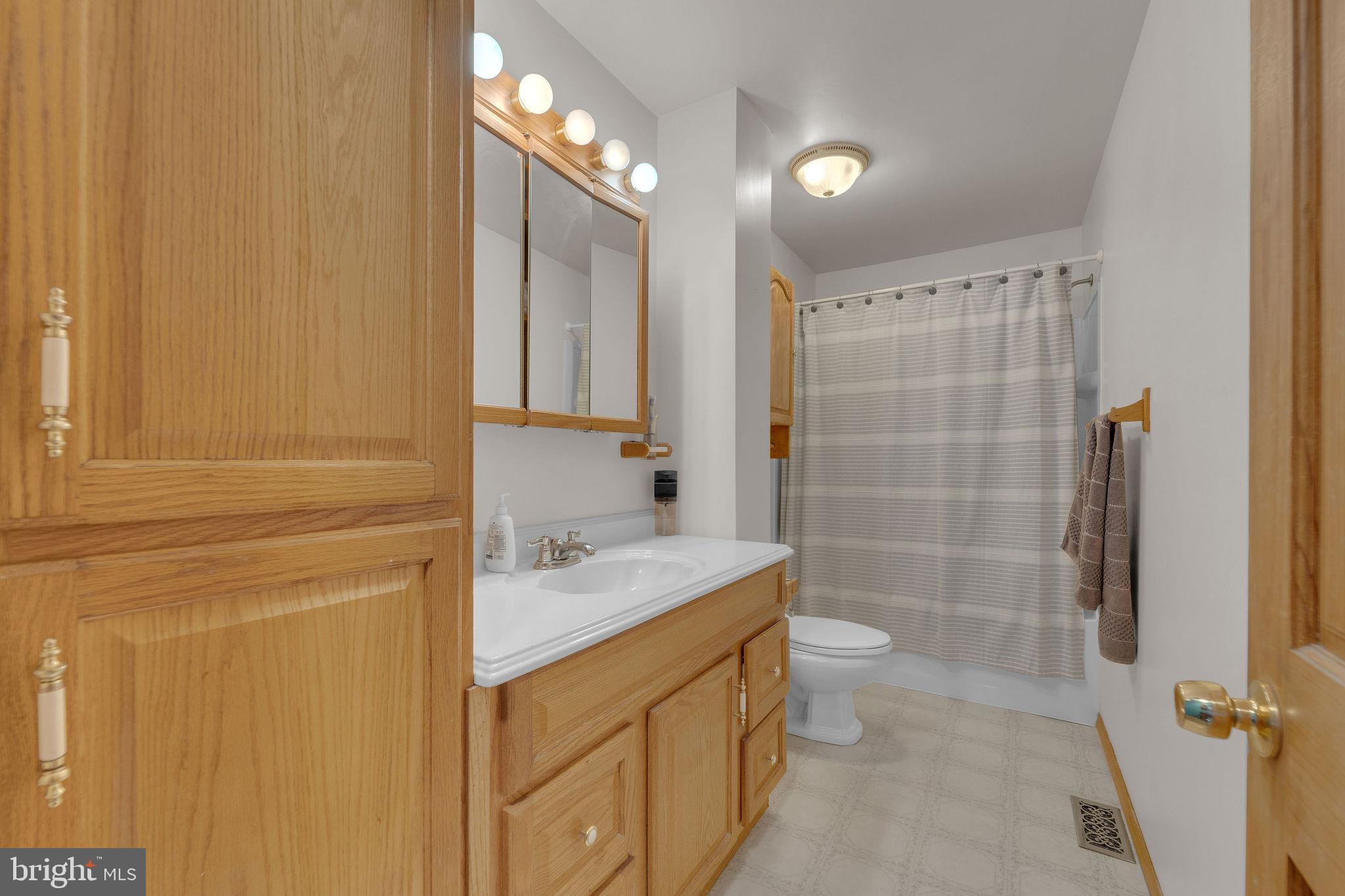 60 Waterford-Blue Anchor Road Hammonton, NJ 08037 - Photo 14 of 30 a bathroom with a sink toilet double vanity and shower