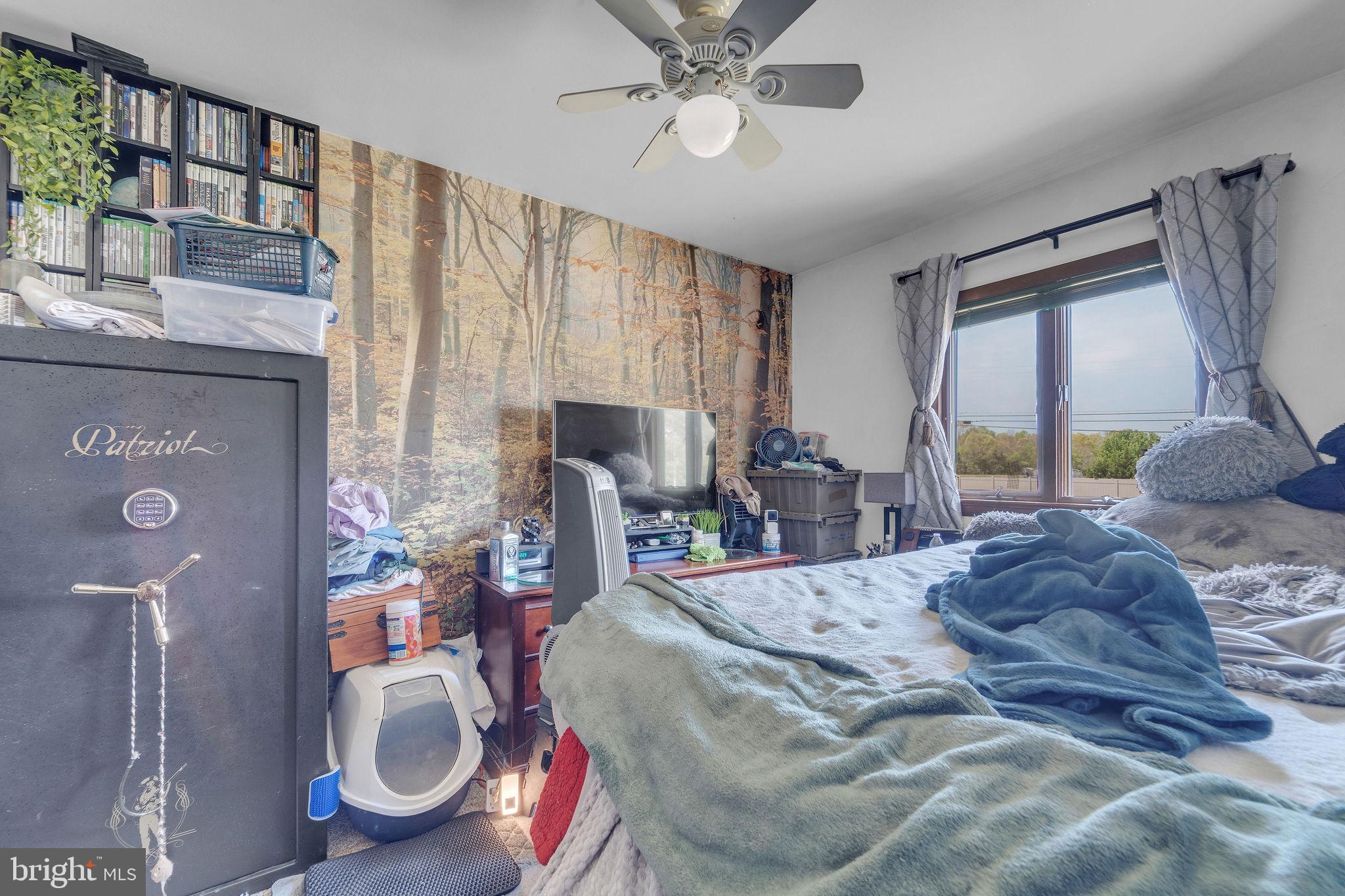 60 Waterford-Blue Anchor Road Hammonton, NJ 08037 - Photo 27 of 30 a bed room with a bed and a window