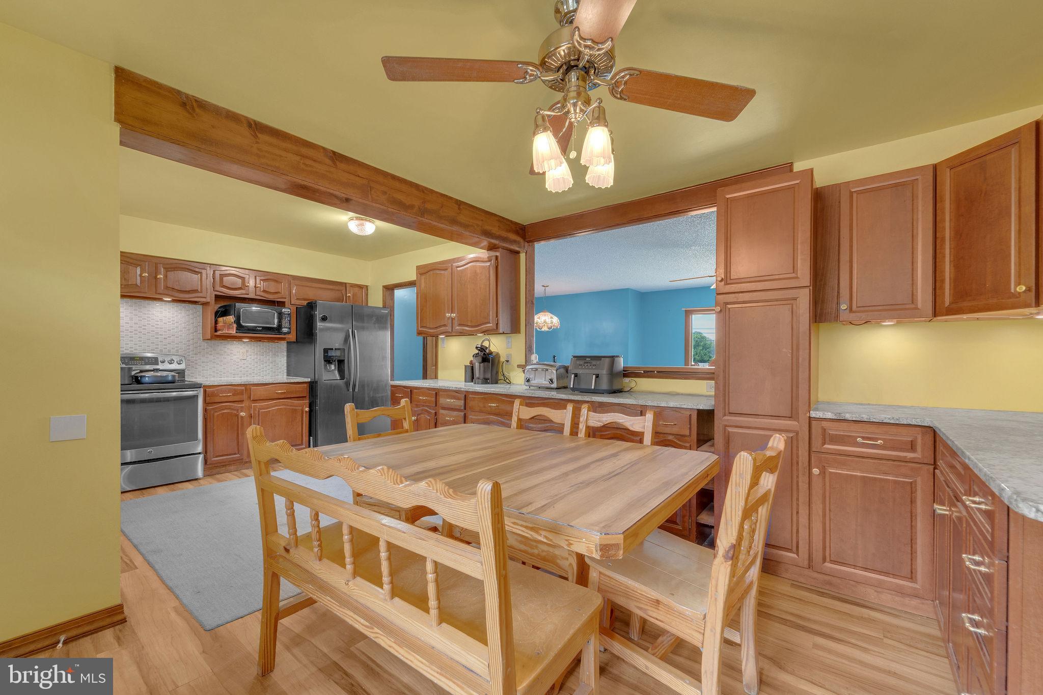 60 Waterford-Blue Anchor Road Hammonton, NJ 08037 - Photo 10 of 30 a large kitchen with a table and chairs