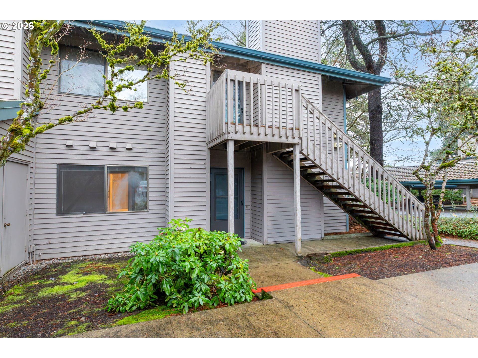 14720 Southwest Grayling Lane Beaverton, OR 97007 - Photo 1 of 32 a view of a house with wooden fence