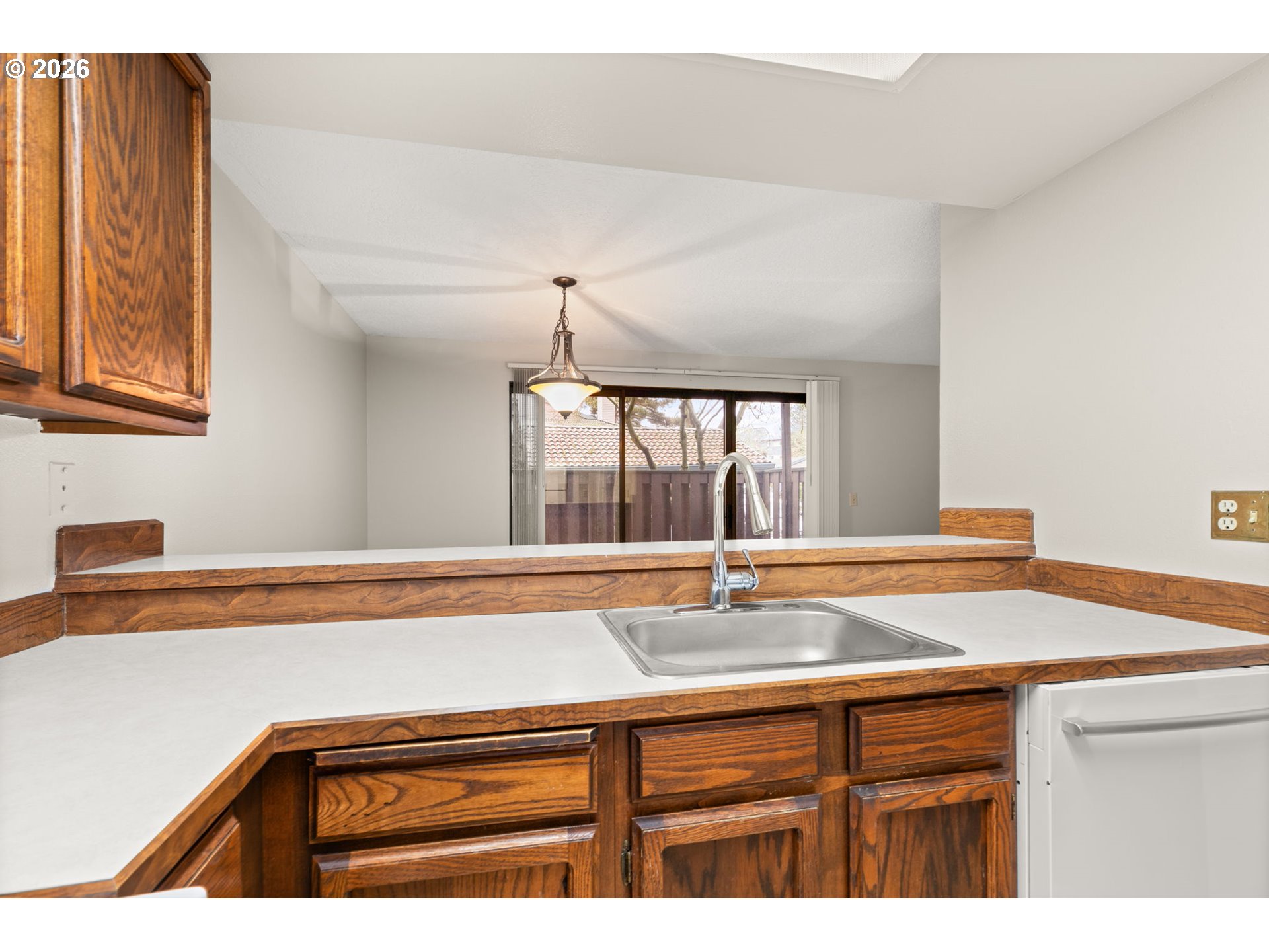 14720 Southwest Grayling Lane Beaverton, OR 97007 - Photo 15 of 32 a bathroom with a sink and a window