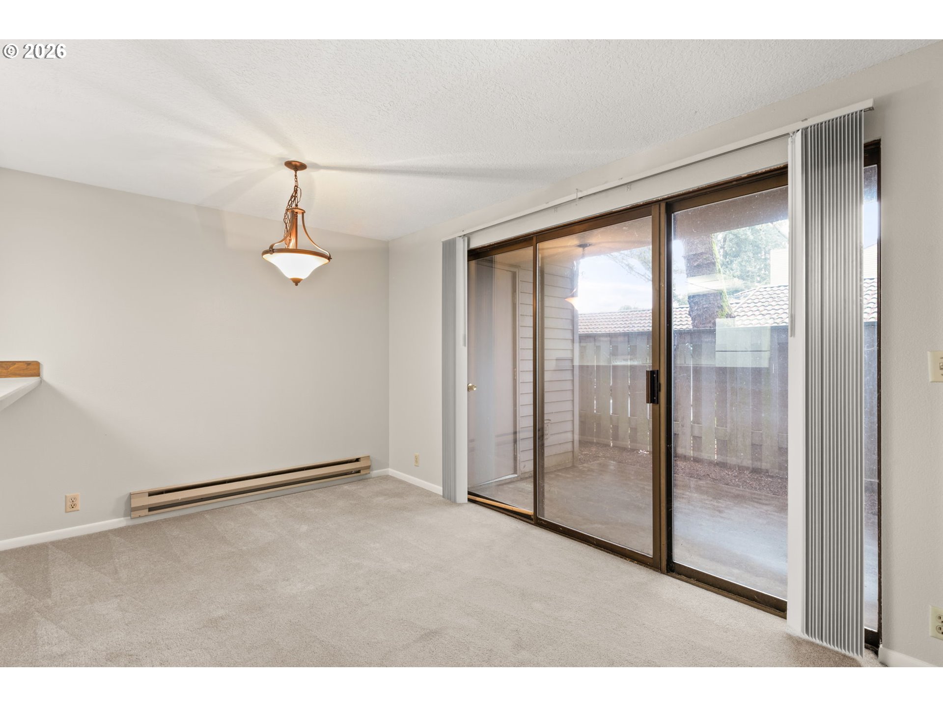 14720 Southwest Grayling Lane Beaverton, OR 97007 - Photo 20 of 32 a view of an empty room with a window