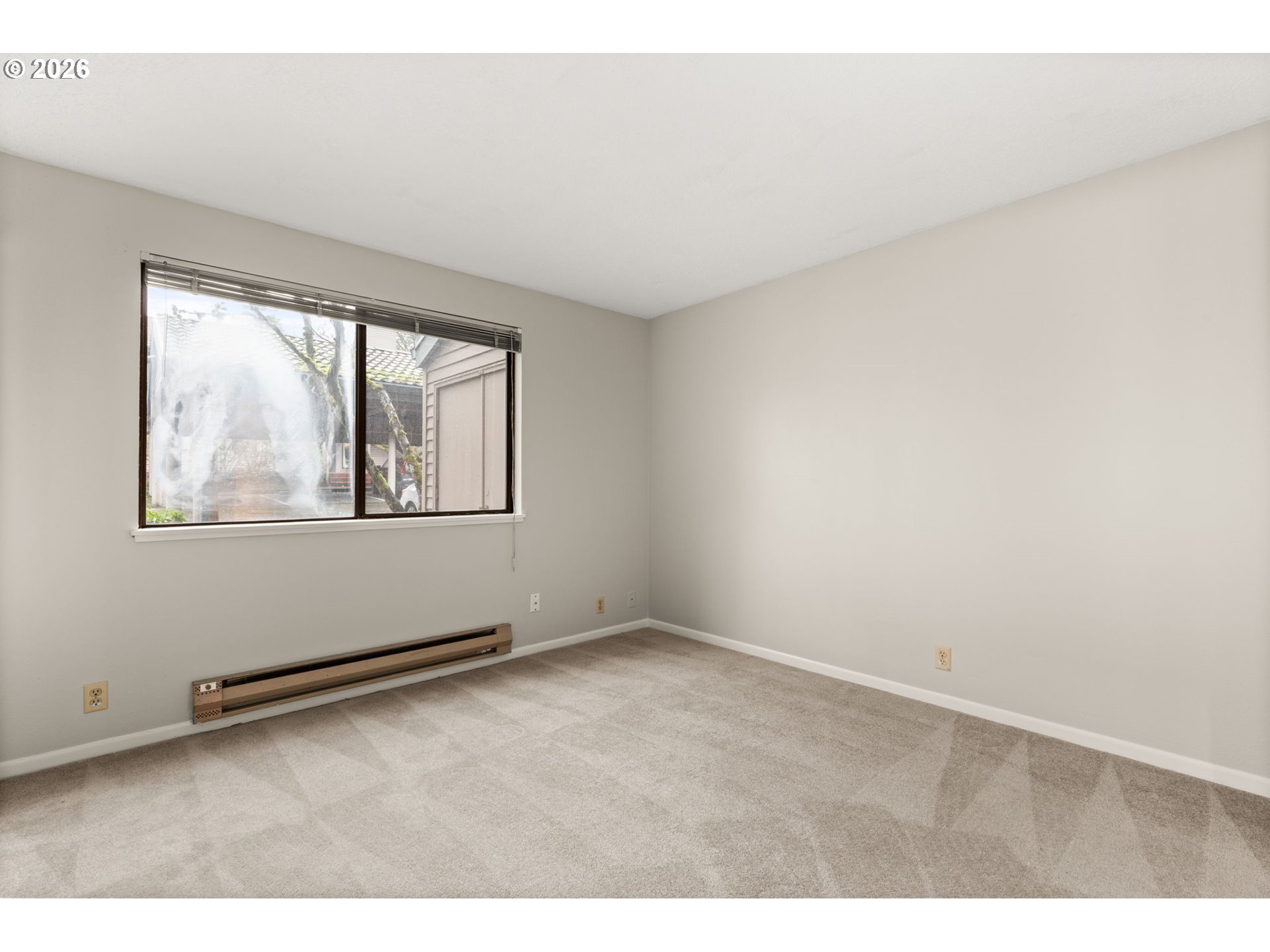 14720 Southwest Grayling Lane Beaverton, OR 97007 - Photo 22 of 32 an empty room with windows