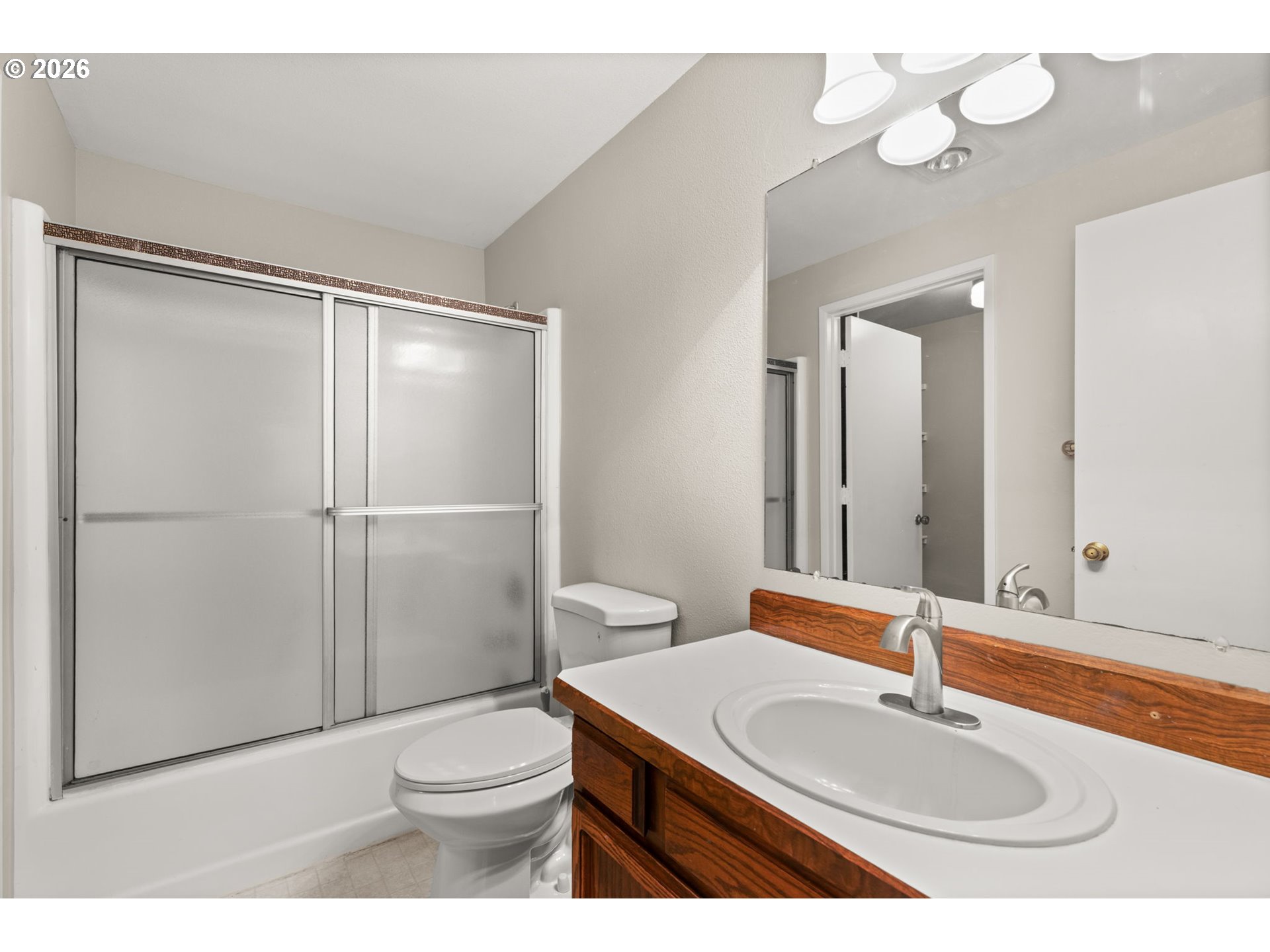 14720 Southwest Grayling Lane Beaverton, OR 97007 - Photo 26 of 32 a bathroom with a sink toilet and shower